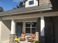 Front porch with two chairs.